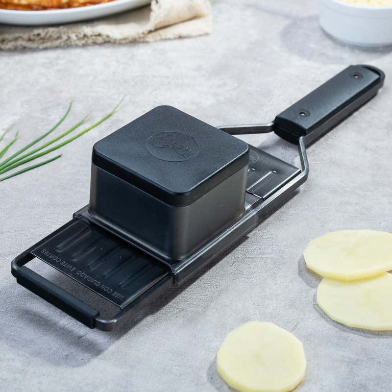 Mandolina de mano con sujetador